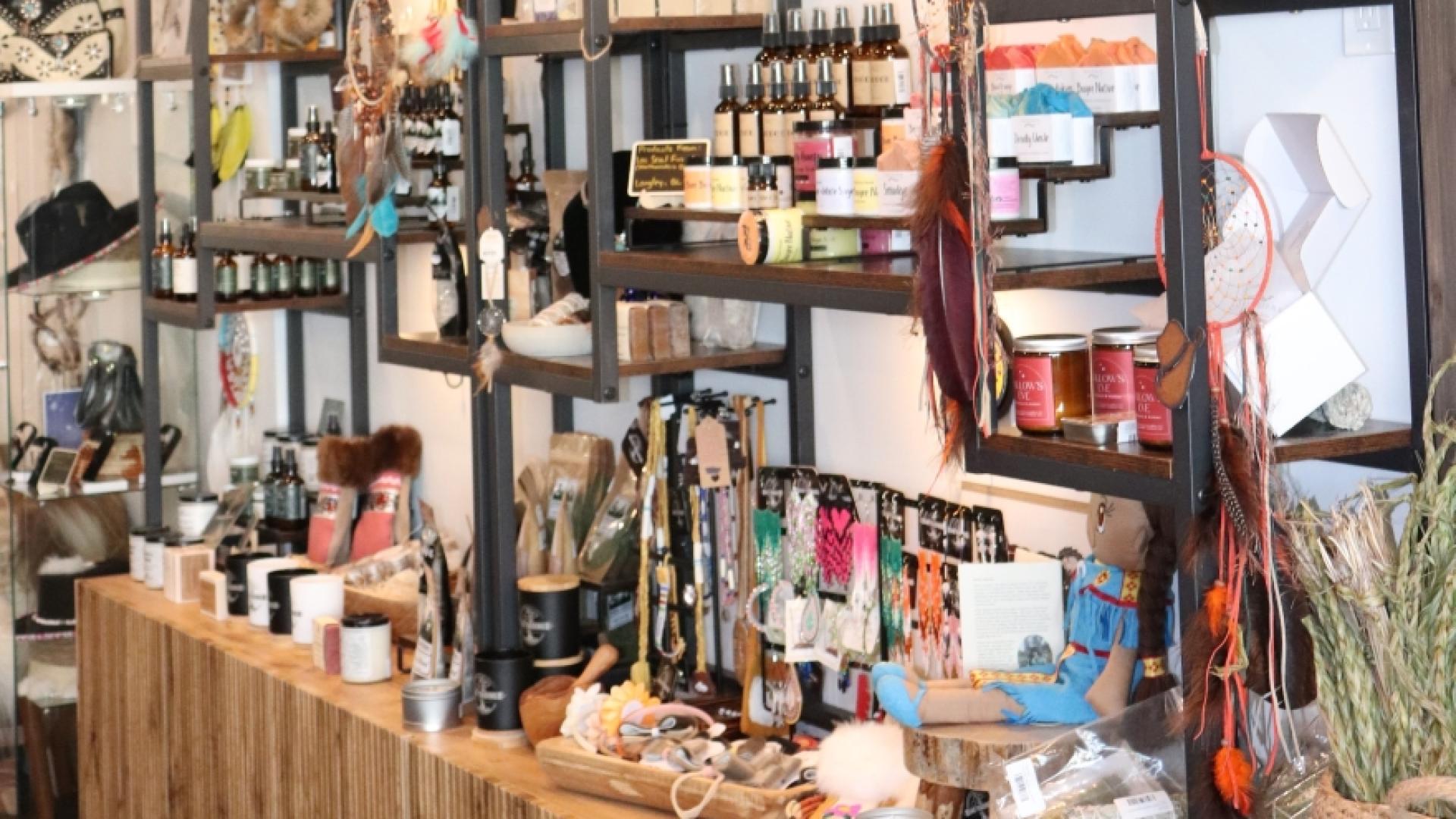 A cozy shop interior with shelves displaying artisanal products.