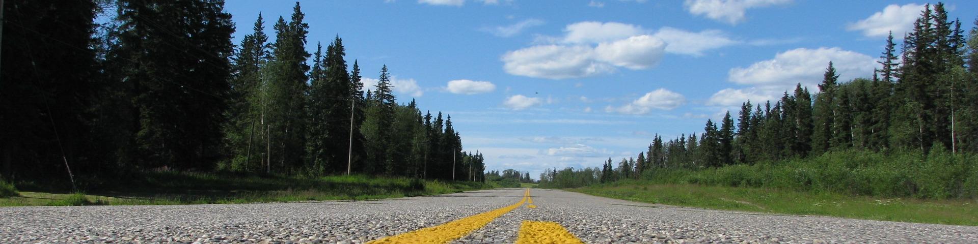 The Alaska Highway amongst the trees just outside Fort St. John.