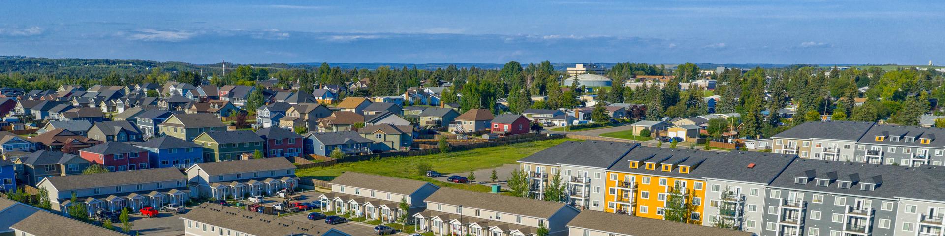A landscape of a neighbourhood with multiple housing options.