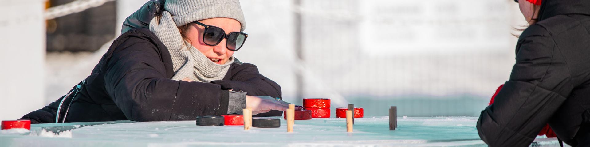 A person plays an ice game at the annual Fort St. John Winter Fest.