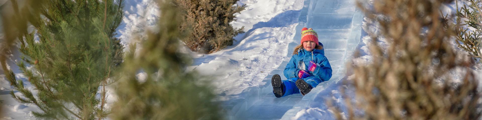 A child slides down the ice slides during the Fort St. John Winter Fest.